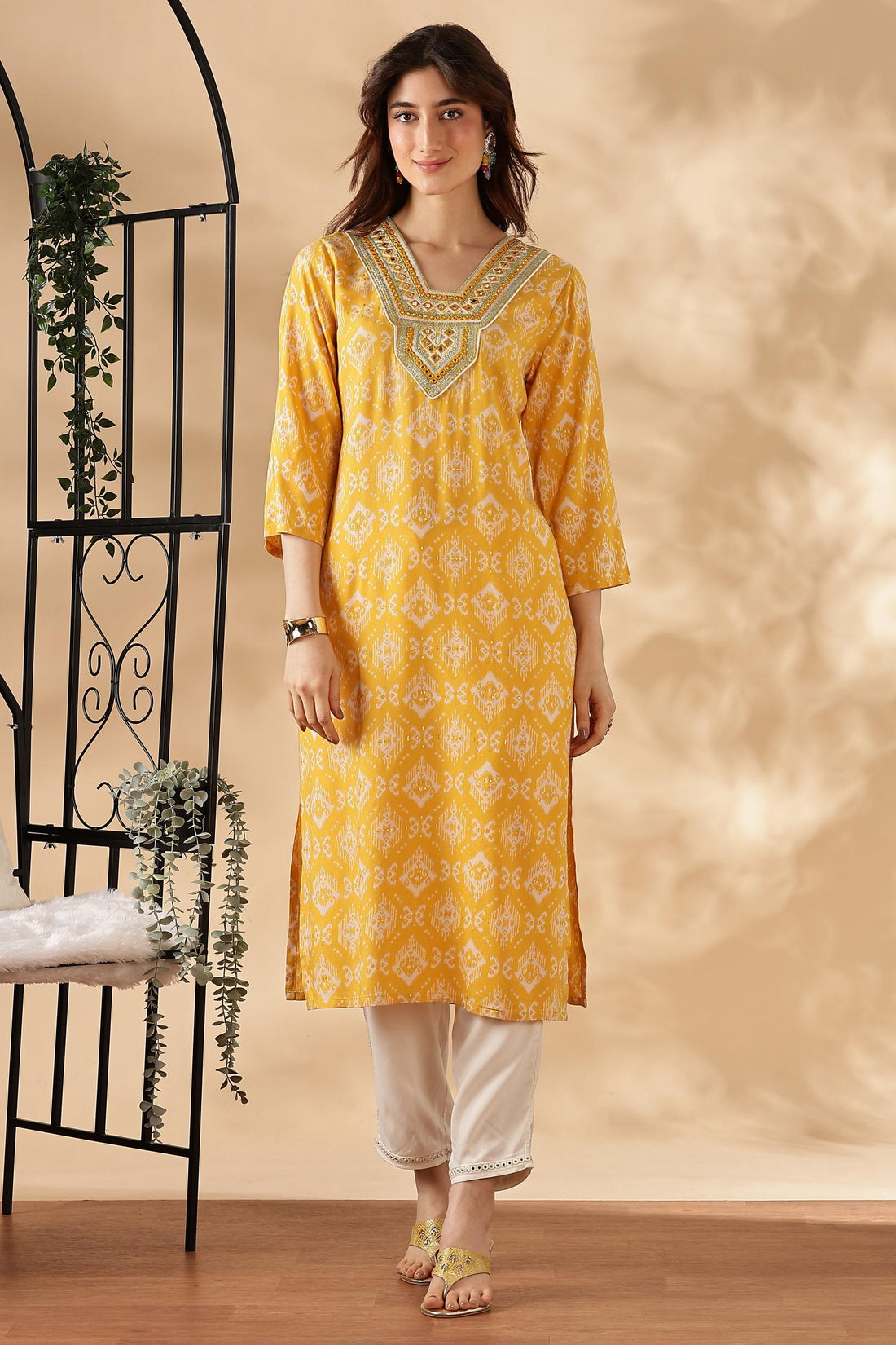 Sagarika Printed Yellow & Off White Salwar Suit with Hand Embroidered Mirror Work Neckline in Viscose