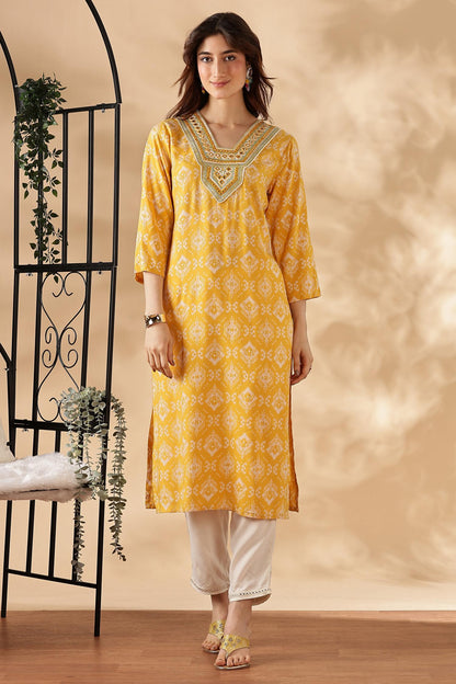 Sagarika Printed Yellow & Off White Salwar Suit with Hand Embroidered Mirror Work Neckline in Viscose