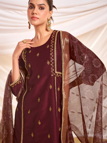 Kayra Maroon Sequins Motif Work A-Line Suit Set with Lace Border Detail in Chinnon Silk with Pure Cotton Mul Lining