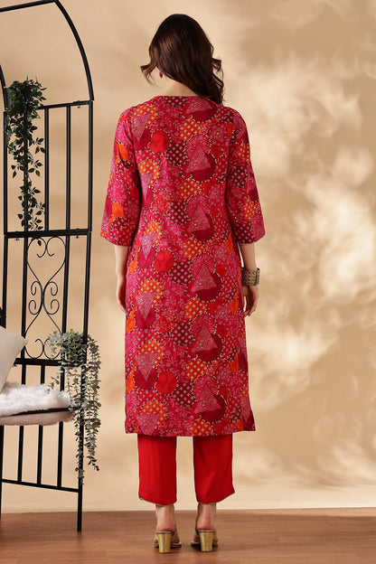 Kamolika Printed Fuschia Salwar Suit with Hand Zari Thread Embroidered Neckline in Viscose