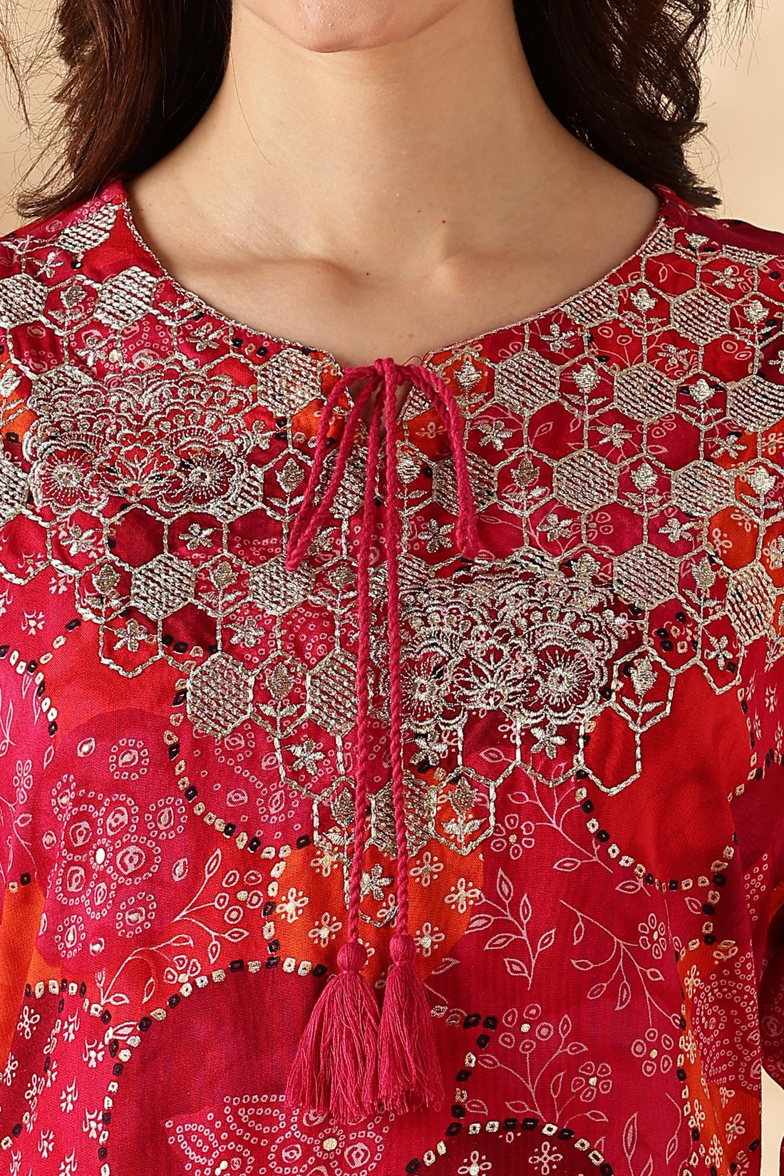 Kamolika Printed Fuschia Salwar Suit with Hand Zari Thread Embroidered Neckline in Viscose