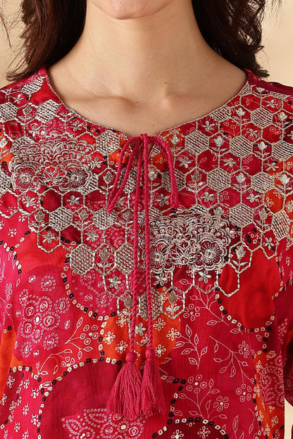 Kamolika Printed Fuschia Salwar Suit with Hand Zari Thread Embroidered Neckline in Viscose