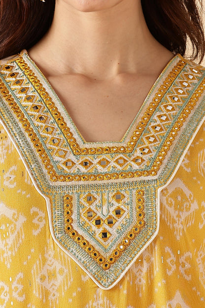 Sagarika Printed Yellow & Off White Salwar Suit with Hand Embroidered Mirror Work Neckline in Viscose