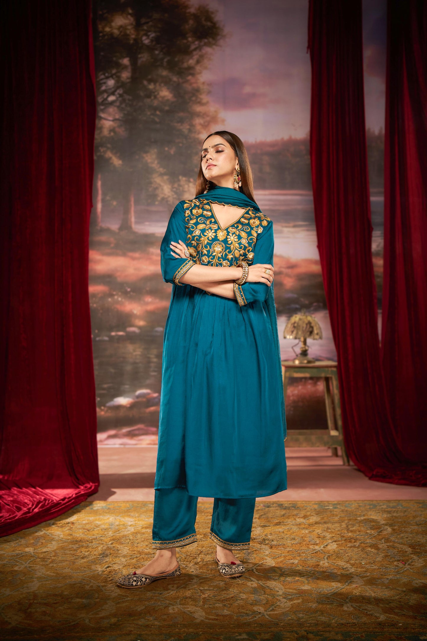 Raajvee Peacock Blue Pure Silk Suit Set with Dupatta and Cotton Mul Lining Featuring Handcrafted Resham and Zari Embroidery with Sequin Embellished Designer Neckline