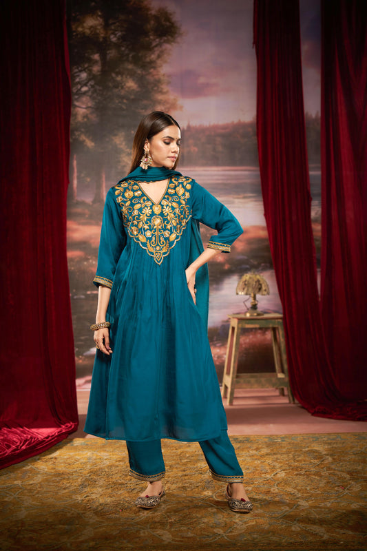 Raajvee Peacock Blue Pure Silk Suit Set with Dupatta and Cotton Mul Lining Featuring Handcrafted Resham and Zari Embroidery with Sequin Embellished Designer Neckline