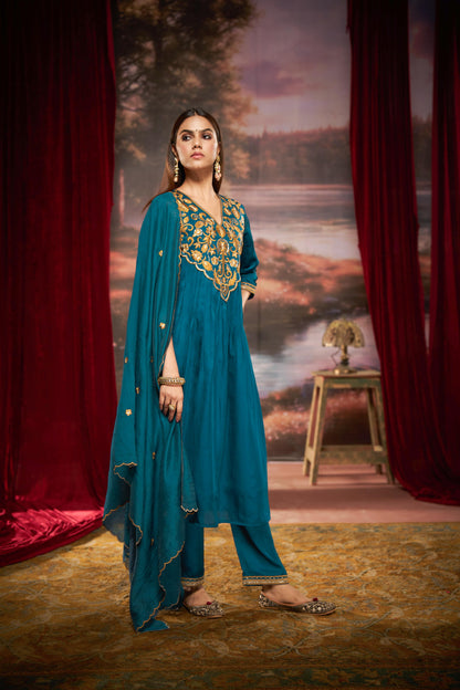 Raajvee Peacock Blue Pure Silk Suit Set with Dupatta and Cotton Mul Lining Featuring Handcrafted Resham and Zari Embroidery with Sequin Embellished Designer Neckline