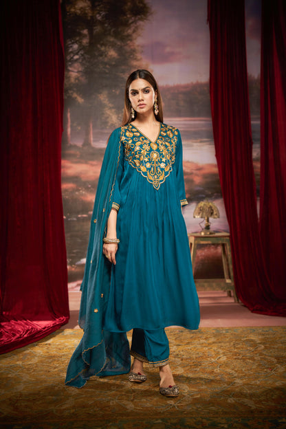 Raajvee Peacock Blue Pure Silk Suit Set with Dupatta and Cotton Mul Lining Featuring Handcrafted Resham and Zari Embroidery with Sequin Embellished Designer Neckline
