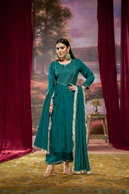 Raajvee Teal Pure Silk A-Line Kurta Set with Cotton Mul Lining Featuring Hand Kantha-Inspired Thread Embroidery, Coin Sequin Accents and Zari Border Dupatta