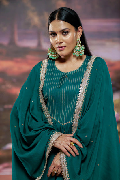 Raajvee Teal Pure Silk A-Line Kurta Set with Cotton Mul Lining Featuring Hand Kantha-Inspired Thread Embroidery, Coin Sequin Accents and Zari Border Dupatta