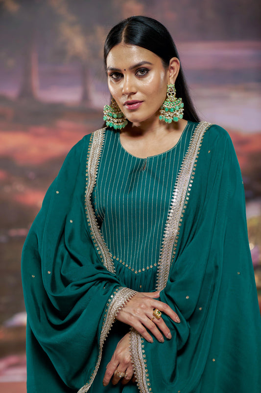 Raajvee Teal Pure Silk A-Line Kurta Set with Cotton Mul Lining Featuring Hand Kantha-Inspired Thread Embroidery, Coin Sequin Accents and Zari Border Dupatta