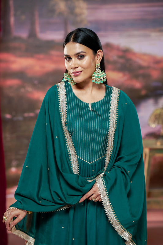 Raajvee Teal Pure Silk A-Line Kurta Set with Cotton Mul Lining Featuring Hand Kantha-Inspired Thread Embroidery, Coin Sequin Accents and Zari Border Dupatta