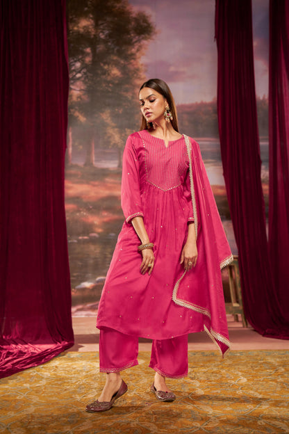 Raajvee Fuchsia Pure Silk A-Line Kurta Set with Cotton Mul Lining Featuring Hand Kantha-Inspired Thread Embroidery, Coin Sequin Accents and Zari Border Dupatta