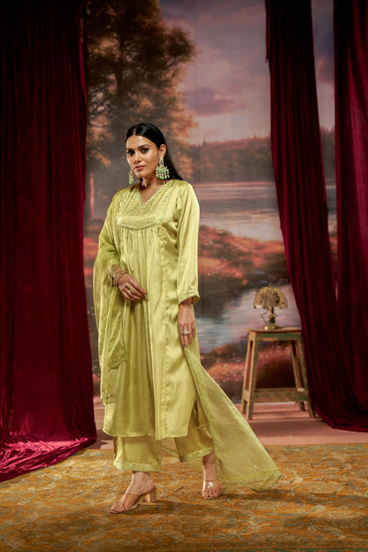 Raajvee Lime Green Pure Silk A-Line Kurta Set with Cotton Mul Lining Featuring Handcrafted Resham Thread Embroidery with Multicolour Sequin and Glass Bugle Embellishments and Coordinated Silk Dupatta