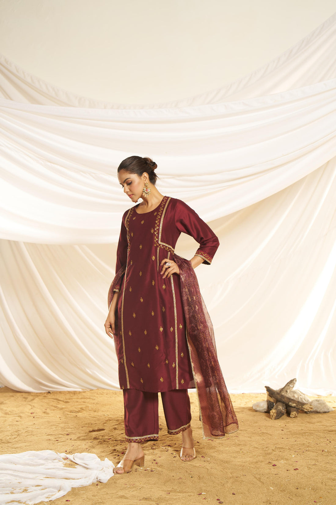 Kayra Maroon Sequins Motif Work A-Line Suit Set with Lace Border Detail in Chinnon Silk with Pure Cotton Mul Lining