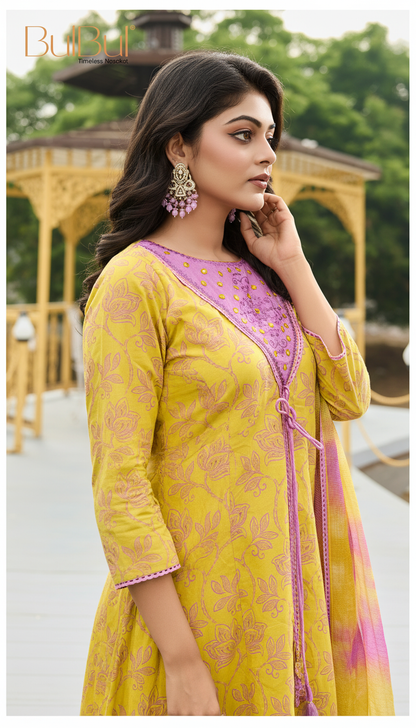 Printed Pure Karina Mustard Floral Cotton Kurta Set with Embroidered and Mirror Work Neckline, Tassel Detailing and Dupatta