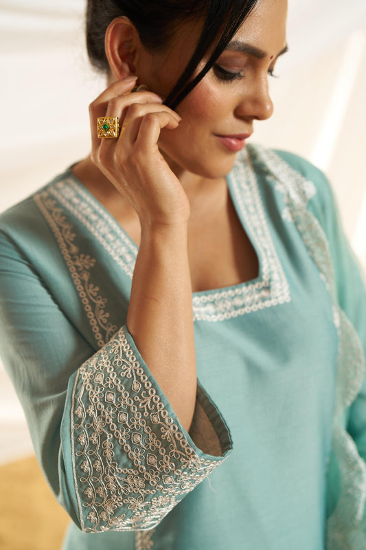 Kayra Aqua Hand Aari Embroidered A-Line Suit Set in Chinnon Silk with Pure Cotton Mul Lining