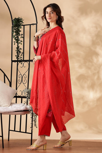 Kamolika Printed Fuschia Salwar Suit with Hand Zari Thread Embroidered Neckline in Viscose