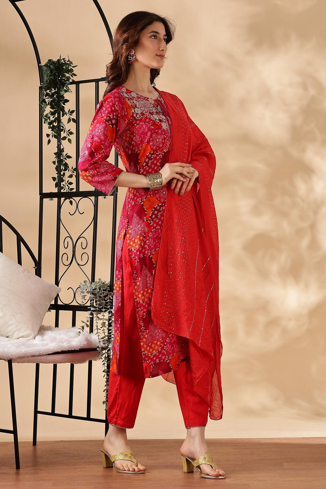 Kamolika Printed Fuschia Salwar Suit with Hand Zari Thread Embroidered Neckline in Viscose