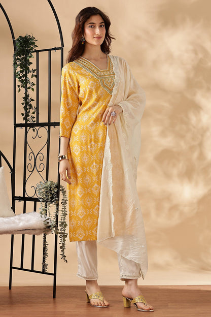 Sagarika Printed Yellow & Off White Salwar Suit with Hand Embroidered Mirror Work Neckline in Viscose