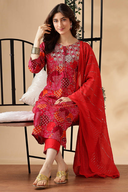Kamolika Printed Fuschia Salwar Suit with Hand Zari Thread Embroidered Neckline in Viscose
