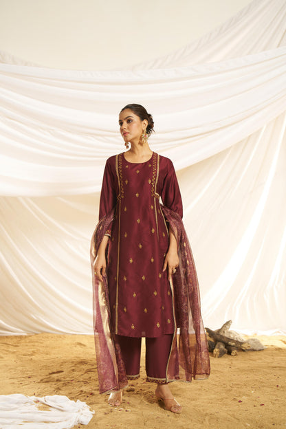 Kayra Maroon Sequins Motif Work A-Line Suit Set with Lace Border Detail in Chinnon Silk with Pure Cotton Mul Lining