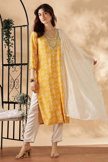 Sagarika Printed Yellow & Off White Salwar Suit with Hand Embroidered Mirror Work Neckline in Viscose