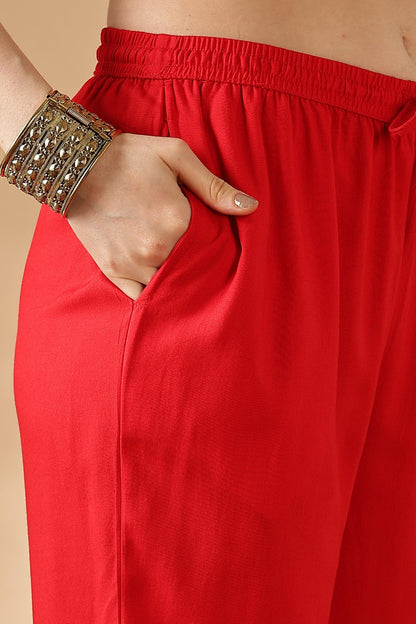Kamolika Printed Fuschia Salwar Suit with Hand Zari Thread Embroidered Neckline in Viscose