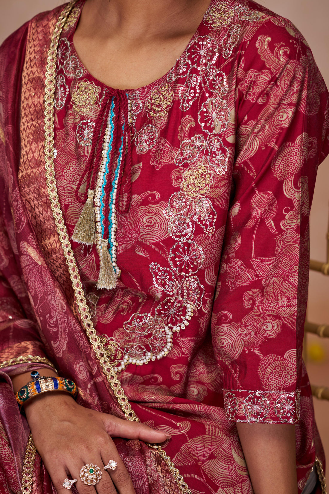 Shehnaaz Maroon Hand Embellished Zari, Sequins & Moti Neck Work Suit Set with Tassel Detail in Chanderi Silk with Pure Cotton Mul Lining