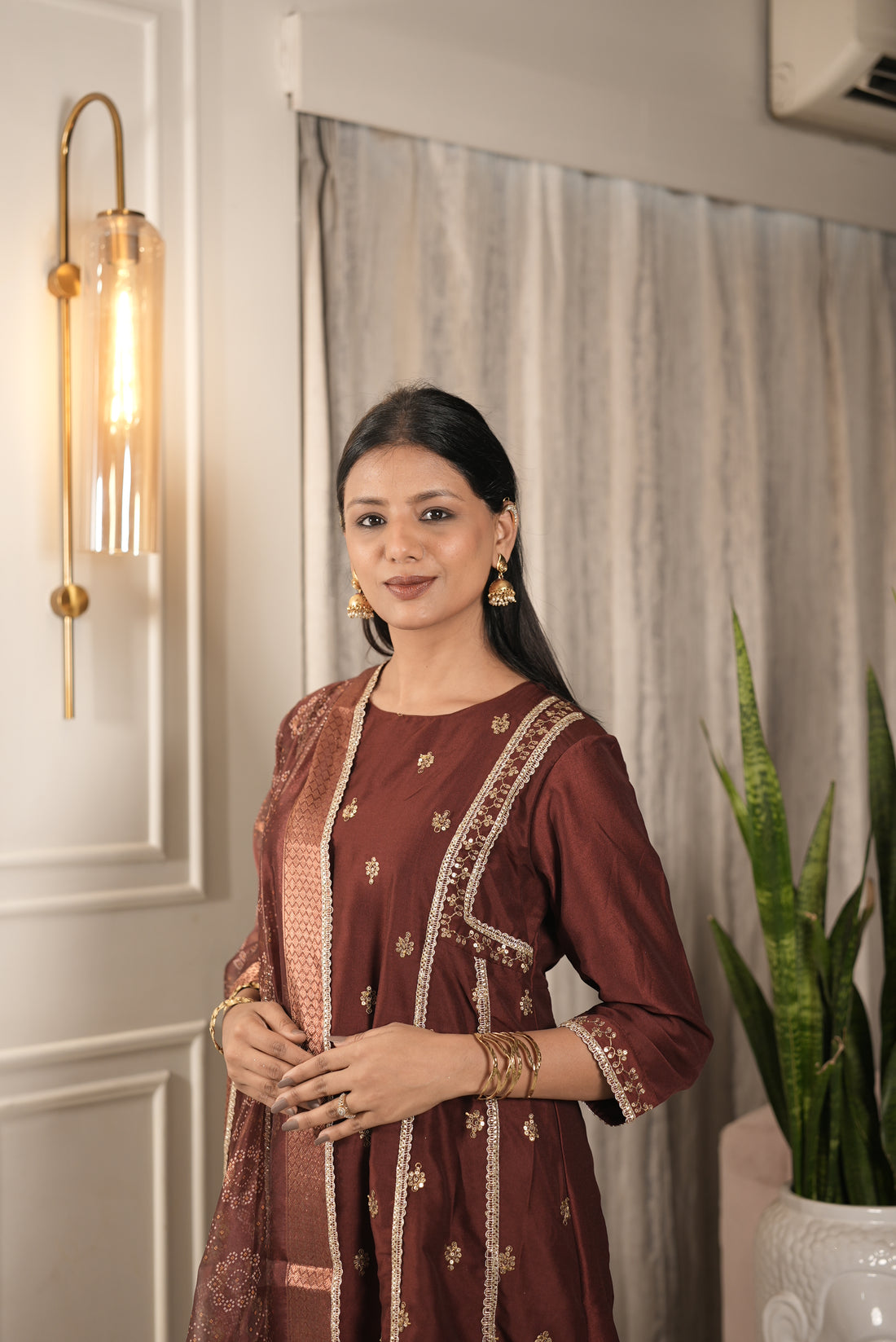 Kayra Maroon Sequins Motif Work A-Line Suit Set with Lace Border Detail in Chinnon Silk with Pure Cotton Mul Lining