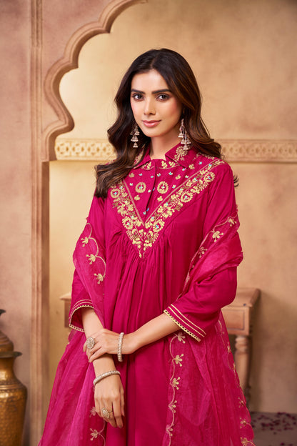 Himawari Fuchsia Handcrafted Golden Zari Dori & Dabka Thread Embroidered Suit Set with Glass Bugle & Sequin Embellished Neck and Dupatta in Pure Muslin with Pure Cotton Mul Lining