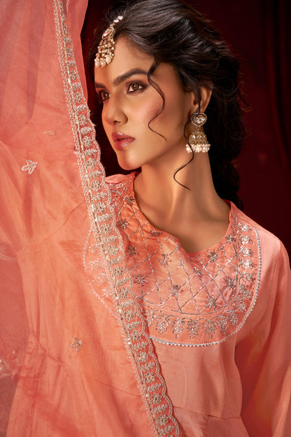 Indu Peach Handcrafted Zari Thread, Sequin & Glass Bugle Embellished Suit Set with Detailed Neckline and Dupatta in Pure Muslin with Pure Cotton Mul Lining
