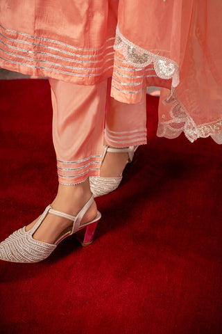 Indu Peach Handcrafted Zari Thread, Sequin & Glass Bugle Embellished Suit Set with Detailed Neckline and Dupatta in Pure Muslin with Pure Cotton Mul Lining