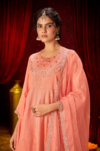 Indu Peach Handcrafted Zari Thread, Sequin & Glass Bugle Embellished Suit Set with Detailed Neckline and Dupatta in Pure Muslin with Pure Cotton Mul Lining