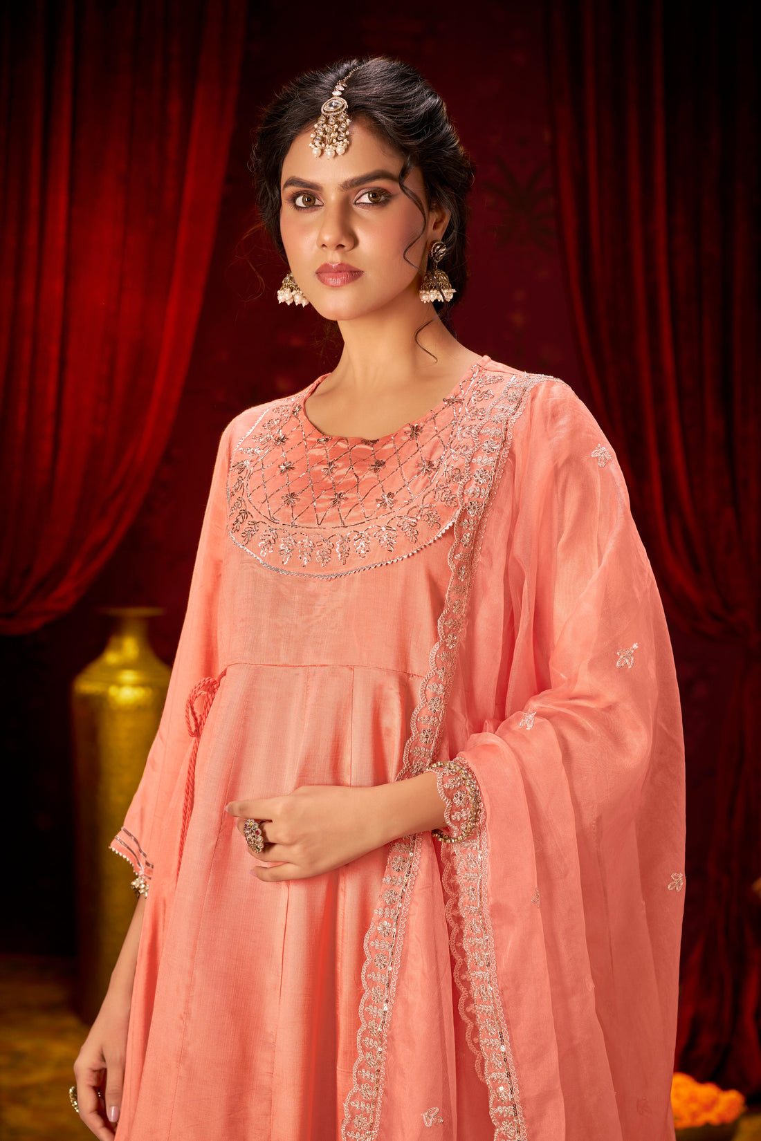 Indu Peach Handcrafted Zari Thread, Sequin & Glass Bugle Embellished Suit Set with Detailed Neckline and Dupatta in Pure Muslin with Pure Cotton Mul Lining