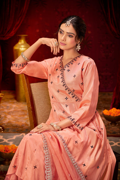Ruqaiya Peach Angrakha Style Hand Thread Embroidered Suit Set with Mirror Detailing in Pure Muslin with Pure Cotton Mul Lining