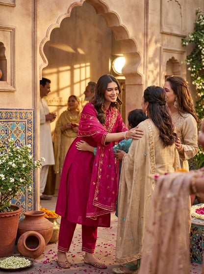 Himawari Fuchsia Handcrafted Golden Zari Dori & Dabka Thread Embroidered Suit Set with Glass Bugle & Sequin Embellished Neck and Dupatta in Pure Muslin with Pure Cotton Mul Lining