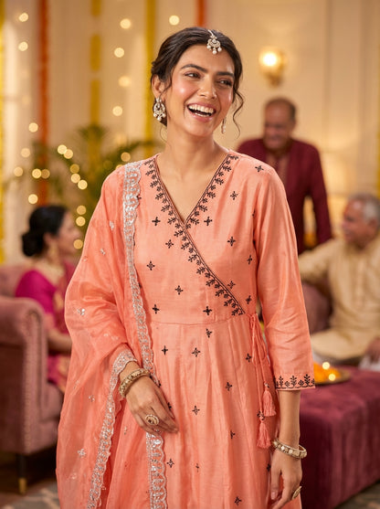 Ruqaiya Peach Angrakha Style Hand Thread Embroidered Suit Set with Mirror Detailing in Pure Muslin with Pure Cotton Mul Lining