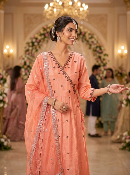 Ruqaiya Peach Angrakha Style Hand Thread Embroidered Suit Set with Mirror Detailing in Pure Muslin with Pure Cotton Mul Lining