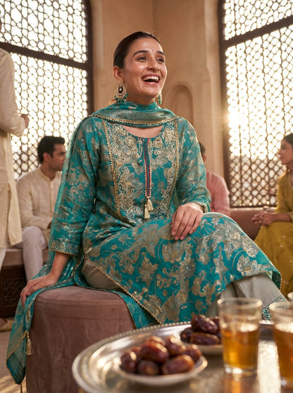 Shehnaaz Rama Hand Embellished Zari, Sequins & Moti Neck Work Suit Set with Tassel Detail in Chanderi Silk with Pure Cotton Mul Lining