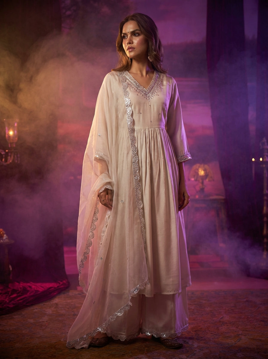 Raajvee Ivory Pure Silk Kurta Set with Cotton Mul Lining Featuring Handcrafted Zari, Sequin, Pearl & Glass Bugle Embellished V-Neck with Organza Dupatta